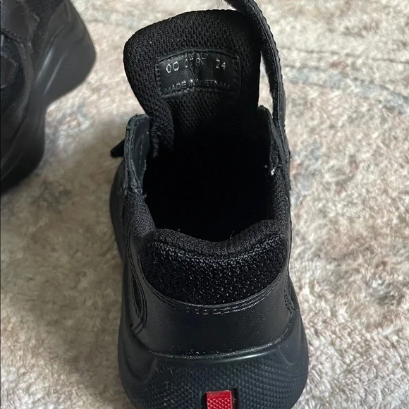 Prada Toddler Black Sneakers with Red Accents - Picture 2 of 5